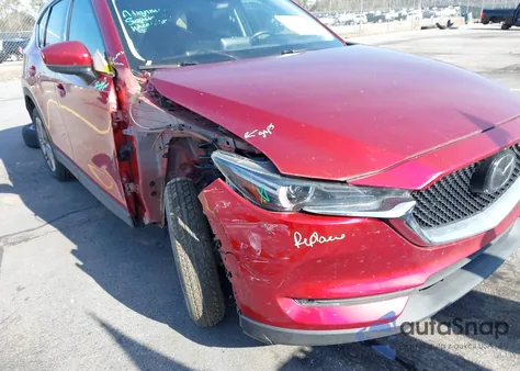 2020 Mazda Cx-5 Grand Touring Reserve z USA, uszkodzony, nr VIN JM3KFBAY5L0844621